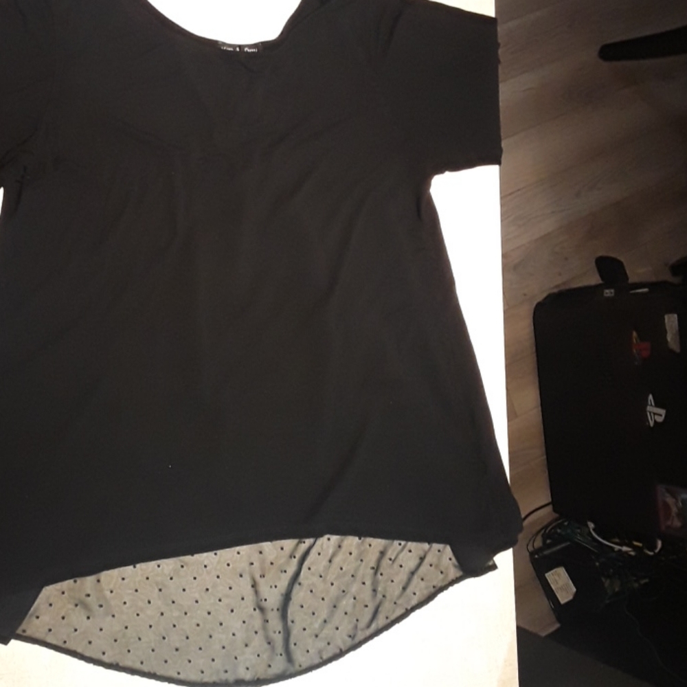 Black short sleeve top with polka dot lace inlay